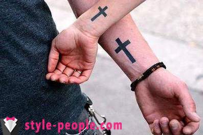 Cross tatuering på armen. dess värde